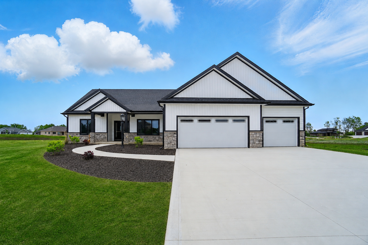 Custom modern farmhouse home at twilight